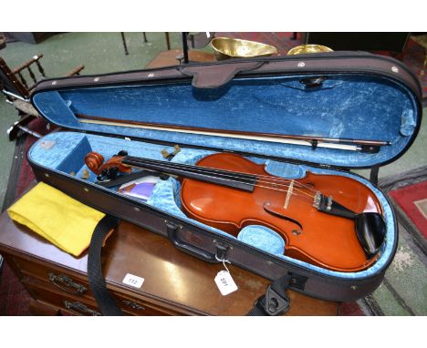 A German Viola, two piece back, double line purfling, ebony pegs, cased with bow, 