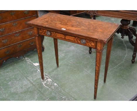 A 19th century Dutch mahogany and marquetry rectangular card table, folding top enclosing an inset baize-lined playing surfac