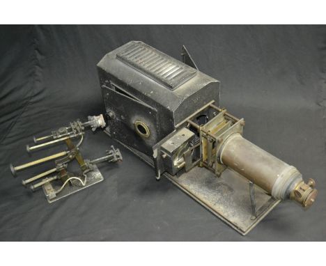 A vintage magic lantern slide projector, with carbon arc light source.