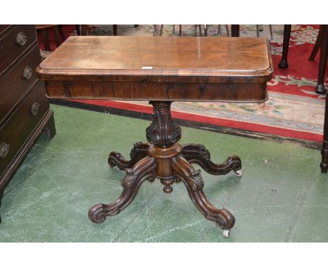 A William IV rosewood rounded rectangular card table, folding top enclosing inset baize-lined playing-surface above a deep fr