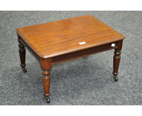 Miniature Furniture - a Victorian mahogany rounded rectangular dining-table, moulded top above a deep frieze, turned legs, ce