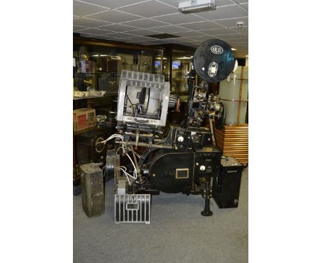 A Kalee Indomitable model.8 projector serial no. 10971fitted with Gaumont arc lamp, Western Electric 708A control cabinet, We