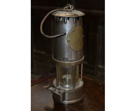A Protector miners lamp, type SL, no.103