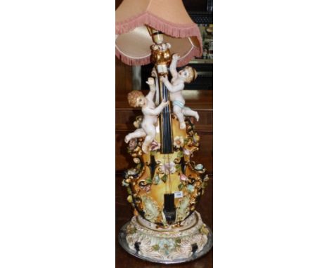 A 1950's Capodimonte violin shaped encrusted table lamp
