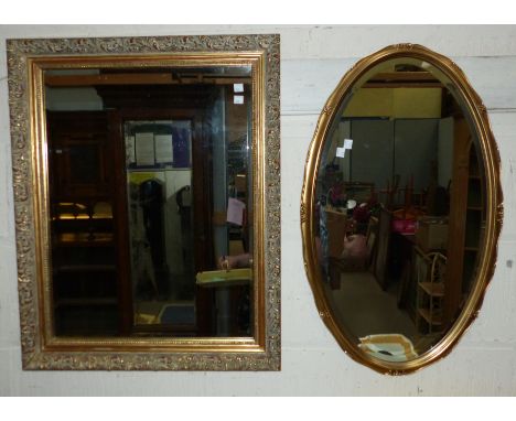 A bevelled glass wall mirror in mahogany frame; 2 gilt framed mirrors