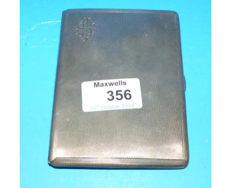 An engine turned cigarette case, Birmingham 1941, 5 oz.