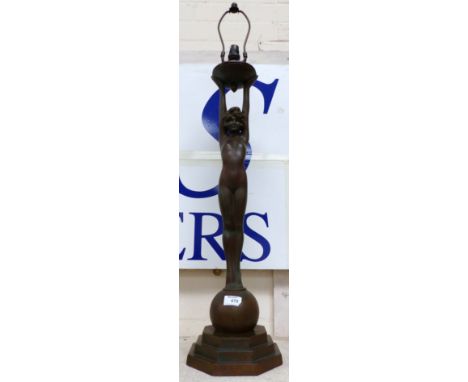 An Art Deco style table lamp in the form of a bronzed female figure