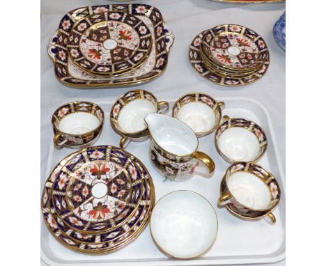 A Royal Crown Derby Japan pattern part tea set comprising 8 cups and saucers, 8 various plates, 2 square cake plates, milk ju