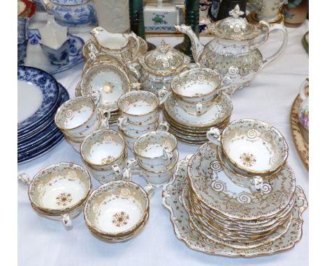 A 19th century Rockingham style part tea service in gilt and grey, 54 pieces approx