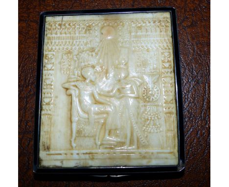 An engine turned rectangular compact, the lid inset with ivory effect panel depicting an ancient Egyptian scene, stamped '935