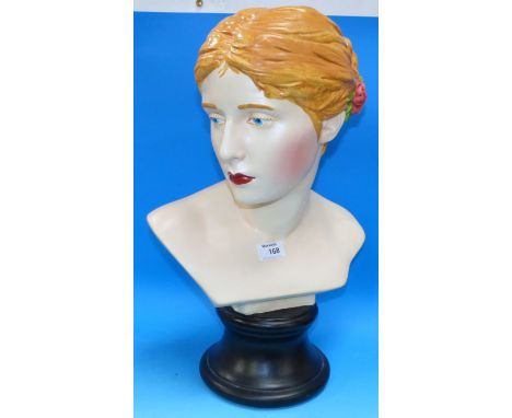 A painted ceramic bust of a 1960's girl