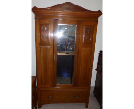 An Edwardian walnut 3 piece bedroom suite comprising mirror door wardrobe, dressing table of 2 long, 2 short and 2 jewellery 