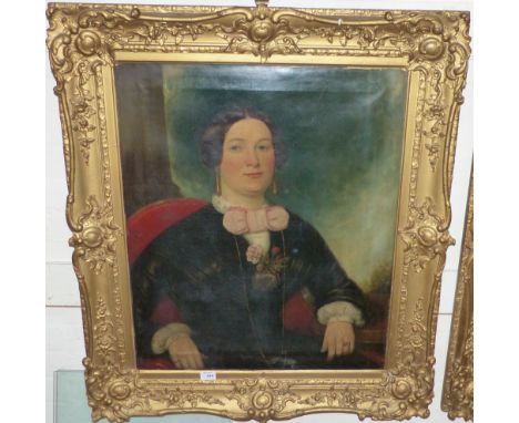 A 19th century oil on canvas:  portrait of a woman with pink bow, 30" x 24", gilt framed