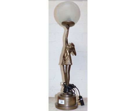 An Art Deco style lamp, girl holding a light globe