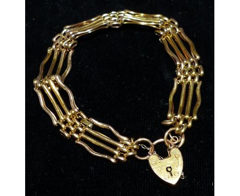 A 9 carat gold gate bracelet with padlock clasp, 14.2 gm