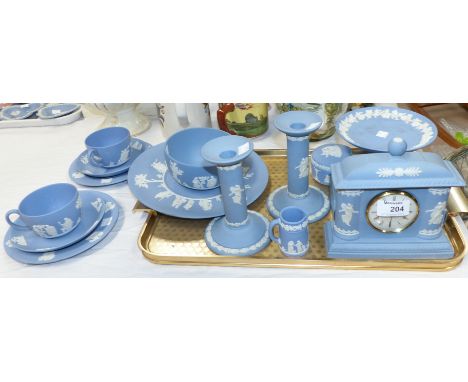 A selection of Wedgwood blue Jasperware including a mantel clock; scent bottle; etc