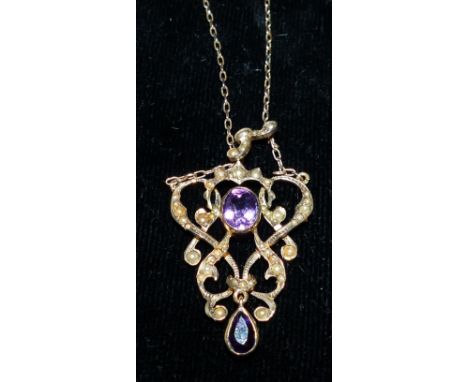 An Edwardian amethyst and seed pearl pendant necklace, stamped '9CT', 6.1 gm