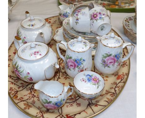 An Aynsley china part tea service decorated with polychrome bouquets, 22 pieces approx