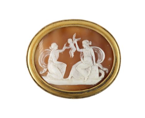 A shell cameo, second half of the 19th centuryOval, the mythological scene carved to depict a putto between two seated and kn