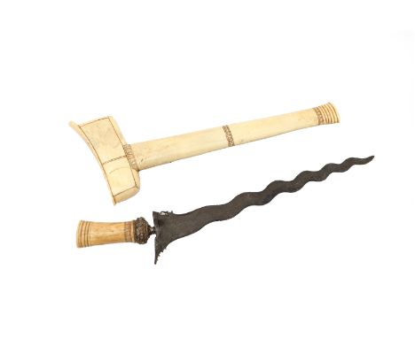  A kris with scabbard and handle made of bone, also a decorated edge on the handle with vinaigrette and pieces of glass. The 
