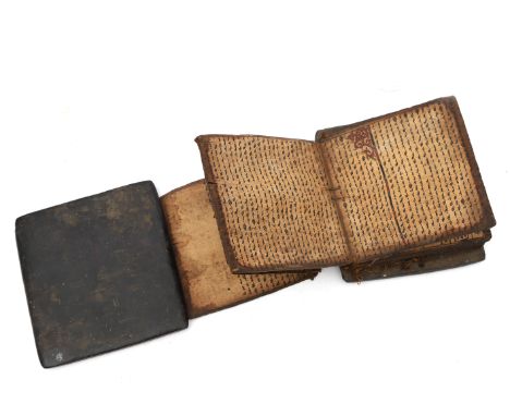  A Toba Batak - Indonesia - The pages filled with magic text and some drawings depicting animals. 