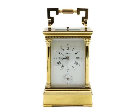 A brass carriage clock,20th century, retailed by Asprey &amp; Co, the two train movement striking on a gong strike with a rep