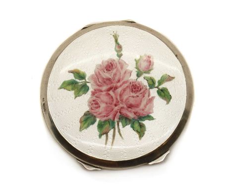 An enamelled silver compact,indistinctly hallmarked, Birmingham 1950, of round form the lid with white guilloche enamel with 
