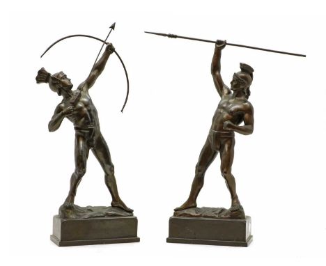 A pair of bronzed figures,20th century, modelled as Classical warriors, one with bow and arrow and the other with a spear on 