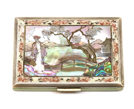 An Austrian enamelled silver compact,1930s, of rectangular form, the lid richly inlaid with a mother of pearl and abalone mos