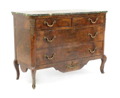 A Continental walnut and gilt metal mounted commode,19th century, with a veined marble top, over two short and two long drawe