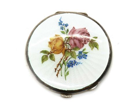 An enamelled silver compact,by Turner &amp; Simpson Ltd, Birmingham 1959, of circular form, the lid enamelled with white guil