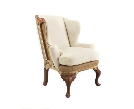 A Queen Anne style walnut wing armchair,20th century, raised on cabriole supports, 92cm wide87cm deep103cm high, seat 42cm hi