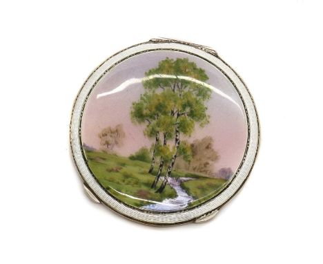 An enamelled silver compact,by Henry Clifford Davies, Birmingham 1949, of round form, the lid decorated in pink enamel with p