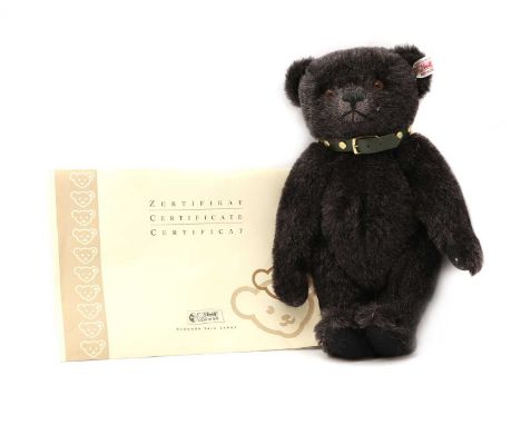 A Steiff 'Jack, The Rare Alpaca Bear', with moveable limbs Steiff tag and button to the left ear26 cm highCondition ReportCom