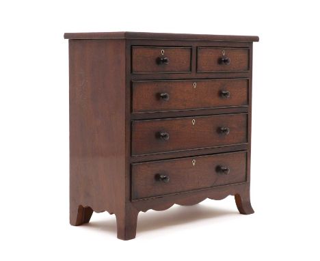 A Regency style mahogany apprentice chest of drawers,late 19th to early 20th century, with two short over three long drawers,