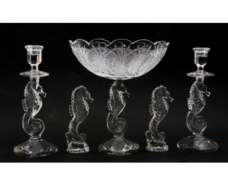 A Waterford glass 'Seahorse' garniture,modern, comprising a pedestal bowl, 30.5cm high; a pair of candlesticks, 29cm highand 