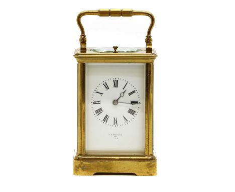 A French brass carriage clock, early 20th century by T.R. Russell, Paris, the white enamel dial with Roman numerals fitted go