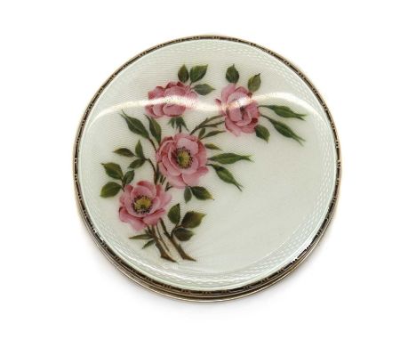 An enamelled silver compact,by Henry Clifford Davies, Birmingham 1955, of round form, the lid with white guilloche enamel in 