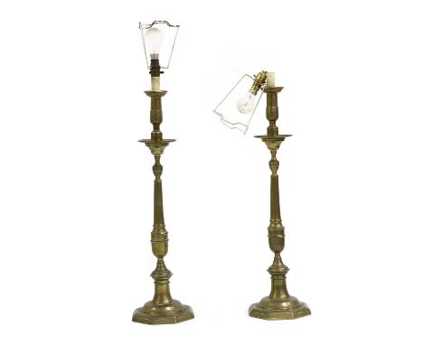 A pair of brass candlestick table lamps,19th century, later converted to electricity, with tapering columns,78cm high to fitt