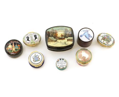 A collection of enamel pillboxes,comprising a hardwood example, the silver inset cover, Edinburgh 1981, with an enamel bird, 