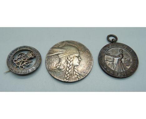 A French white metal medallion, a Woman's Own Cookery medal and a silver wound badge 