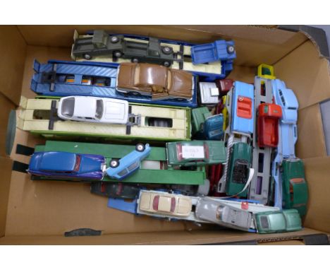 Die-cast model vehicles and car transporters including Dinky, some repainted 