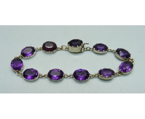 A silver and amethyst bracelet 