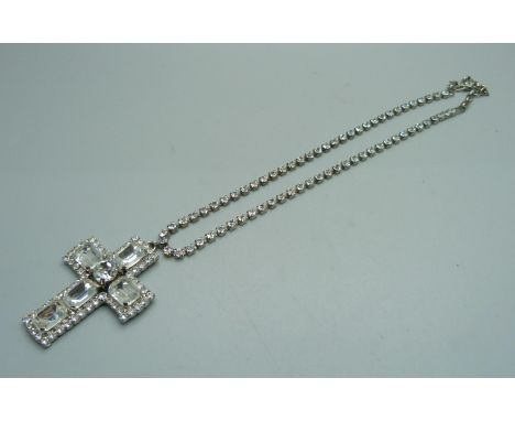 A large Butler and Wilson cross pendant and chain 