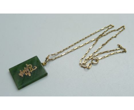 A jade pendant on a 9ct gold chain, chain 1.9g 