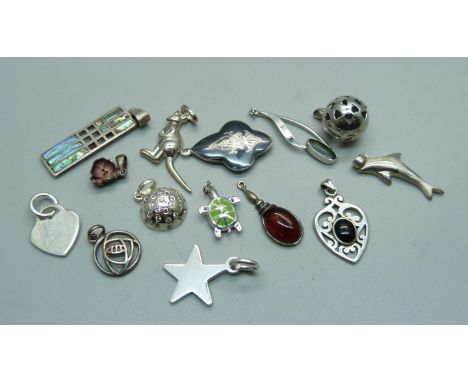 Fourteen silver pendants 