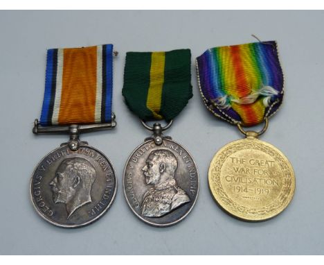 A group of three medals including Territorial Force Effificency Medal to 375104 W.O. CL 2 R. Arundale, Manchester Regt., Terr