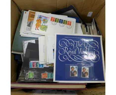 A collection of first day covers, postcards etc. mostly in albums and a quantity of loose stamps 