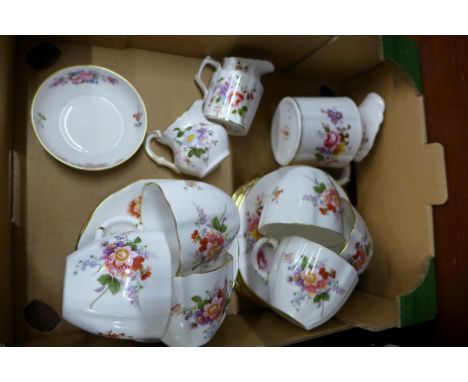 A collection of Royal Crown Derby, Derby Posies china, six cups, saucers, side plates, bowl and three jugs, small jug and dis