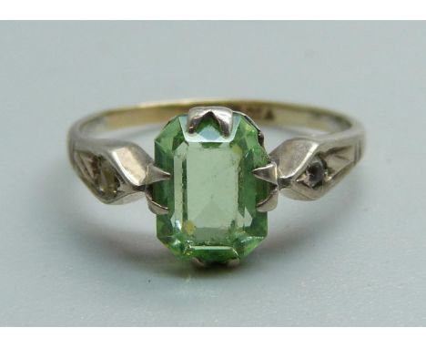 A 9ct gold and silver, green and white stone set ring, L 